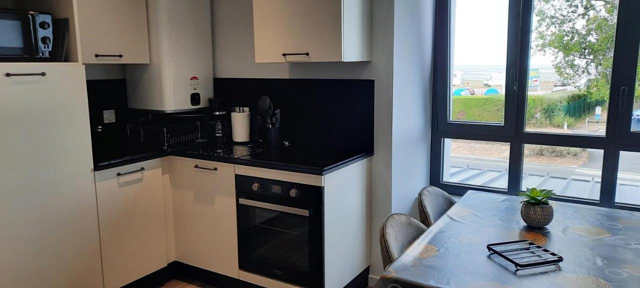 Les Appartements De La B Saint-Benoît-des-Ondes Exteriör bild